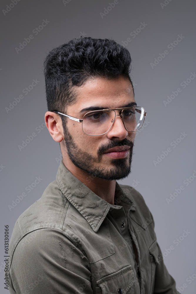 Fototapeta premium Fit Middle Eastern man, serious, three-quarter portrait
