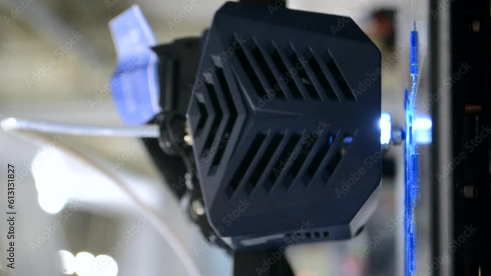 3D printer. 3D printing. 3d printer printing process close-up. 3D printer creating object from molten plastic. Modern three-dimensional printing technologies. Innovation additive technology. Vertical 3D printer. 3D printing. 3d printer printing process close-up. 3D printer creating object from molten plastic. Modern three-dimensional printing technologies. Innovation additive technology. Vertical