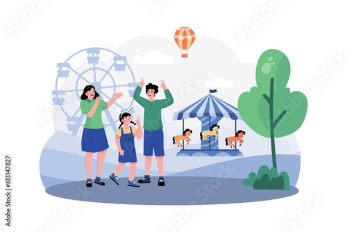 Family visits an amusement park for morning fun.