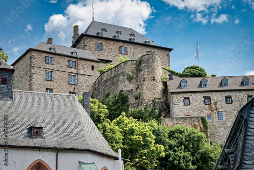 the historic castle blankenheim in the eifel hills in sunny weather photo