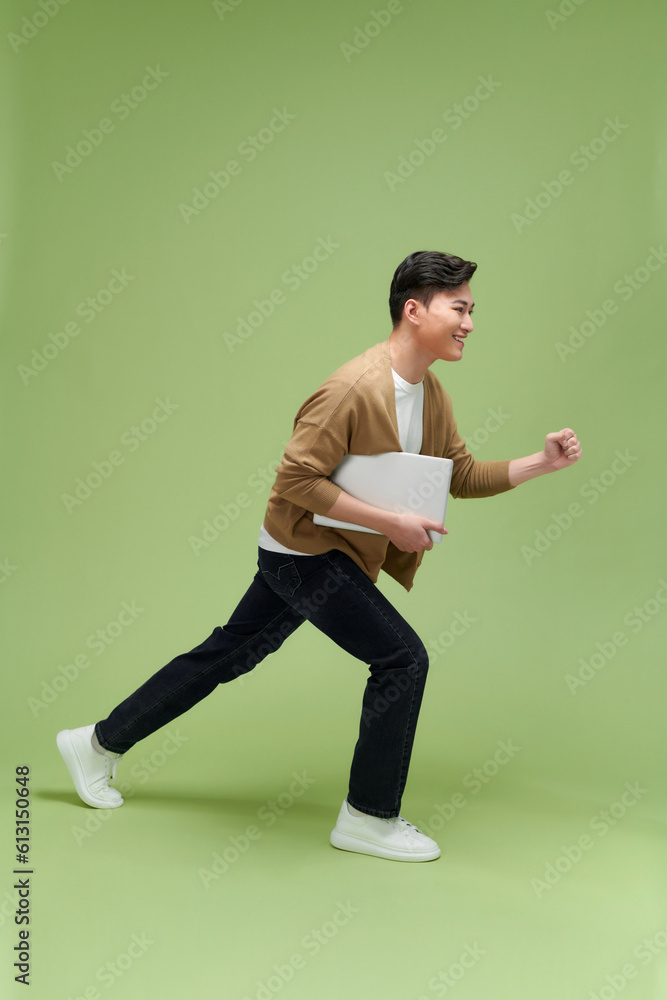 Isolated business man run with laptop Isolated business man run with laptop