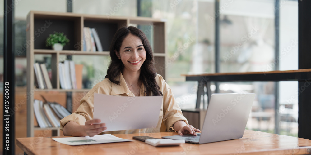 Accountant woman working on laptop and do document, tax, exchange, research, accounting and Financial advisor concept Accountant woman working on laptop and do document, tax, exchange, research, accounting and Financial advisor concept