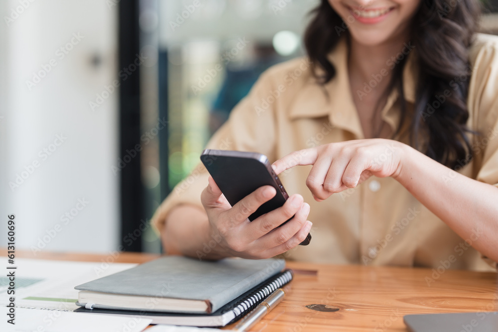 Beautiful Businesswoman completes KYC using an online banking program in order to open a digital savings account. The definition of cyber security Beautiful Businesswoman completes KYC using an online banking program in order to open a digital savings account. The definition of cyber security