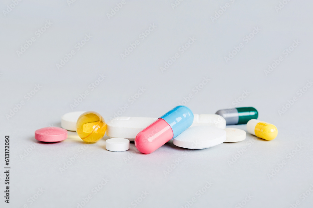 Many different colorful medication and pills perspective view. Set of many pills on colored background Many different colorful medication and pills perspective view. Set of many pills on colored background