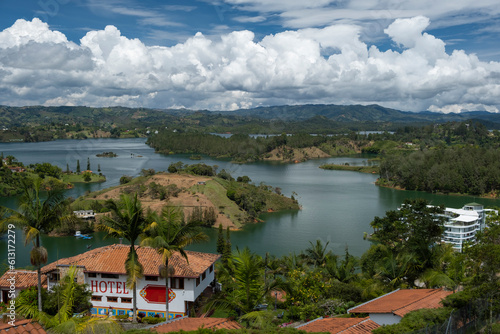 Aerial panoramic view of the hydroelectric reservoir, lakes, mountains and small islands of Guatape, near Medellin, Colombia. Sunny day, blue sky.