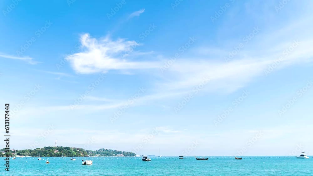 Wonderful nature time lapse moving clouds Pastel blue sky, sea water, ocean. On a sunny summer day, Cloudscape moves over a wide area of clear sky nature. Ao Yon Beach, Phuket, Thailand Wonderful nature time lapse moving clouds Pastel blue sky, sea water, ocean. On a sunny summer day, Cloudscape moves over a wide area of clear sky nature. Ao Yon Beach, Phuket, Thailand
