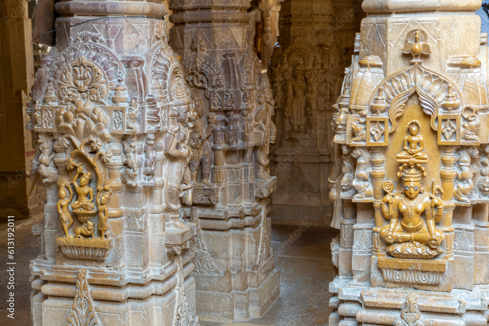 JAISALMER, RAJASTHAN, INDIA - marchy 24, 2023: Detail of the carvings inside Rikhabdev Temple, a Jain Temple located inside the Jaisalmer Fort