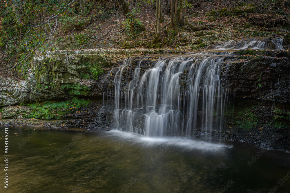 Obraz premium magnificent autumn waterfall