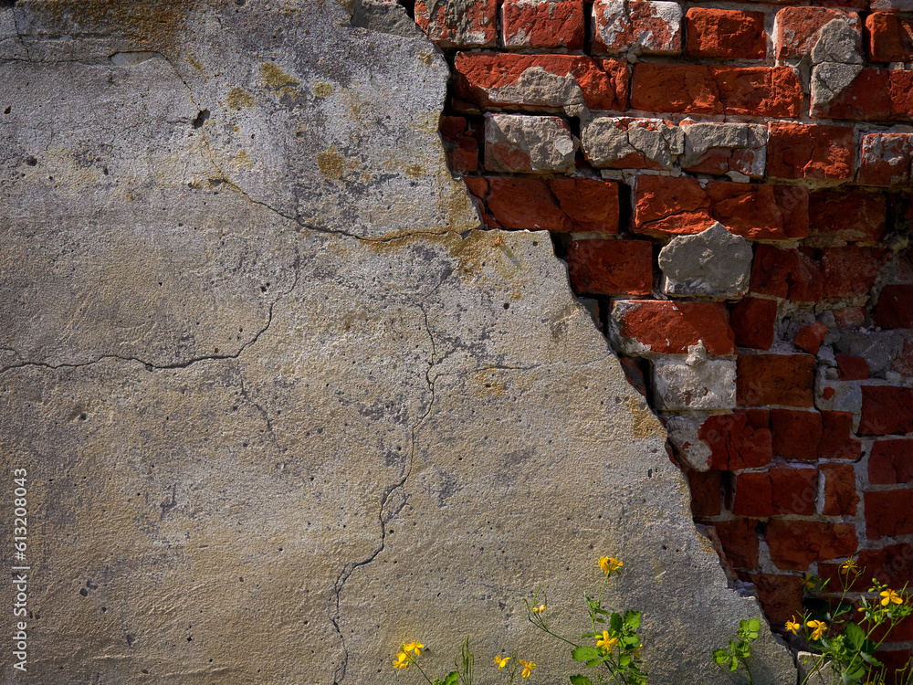 Old brick wall with destroyed plaster. Renovation of old house. Industrial style design wall background. High quality photo      