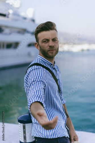 A man in a yacht marina in Marbella, Spain. photo