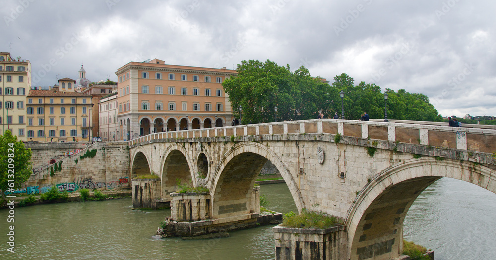 Ancient Ponte Sisto bridge standing over Tiber River in Rome, Italy