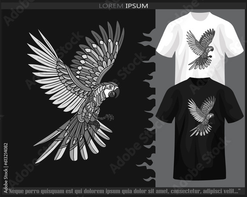 Monochrome macaw bird mandala arts isolated on black and white t shirt.