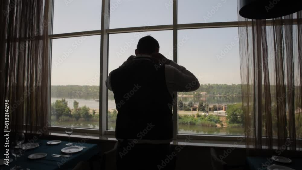 Business man put suit on during morning routine at home, preparing to go to work Business man put suit on during morning routine at home, preparing to go to work
