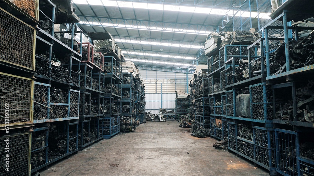 Car parts in old warehouses. Used vehicle part for recycling scrap, Automotive spare parts, Engine at storage warehouse, Recycle goods, metal