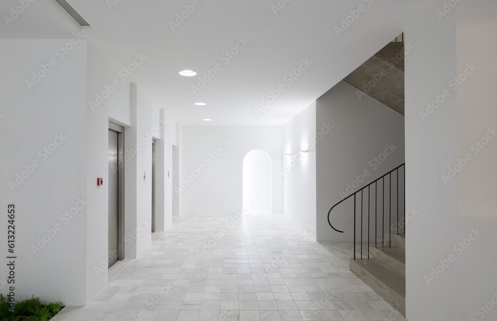 Interior of empty spacious hall with stairs Interior of empty spacious hall with stairs