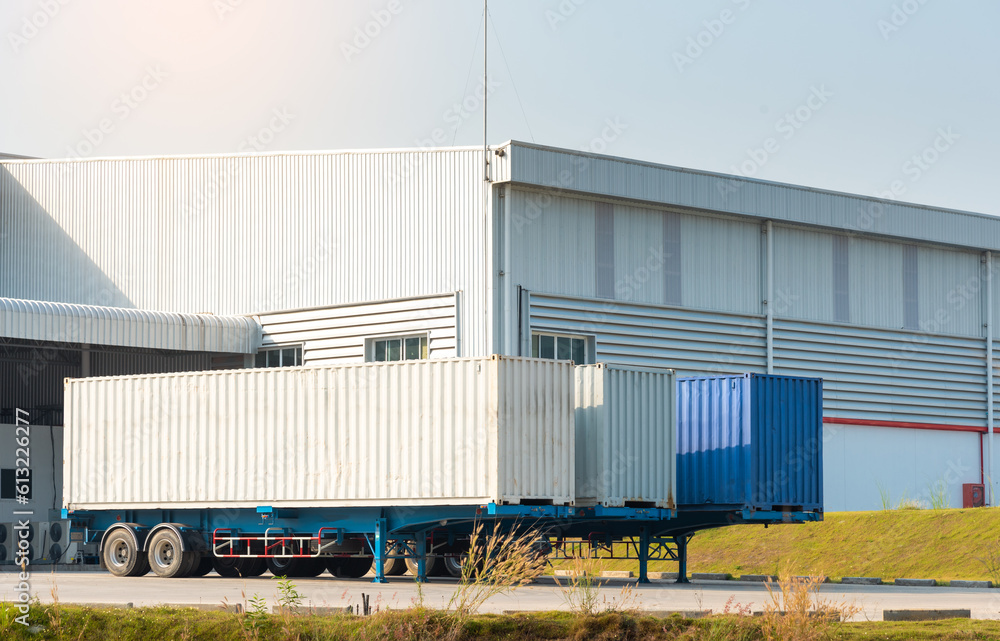 Obraz premium Containers on trailers waiting to be loaded at the factory