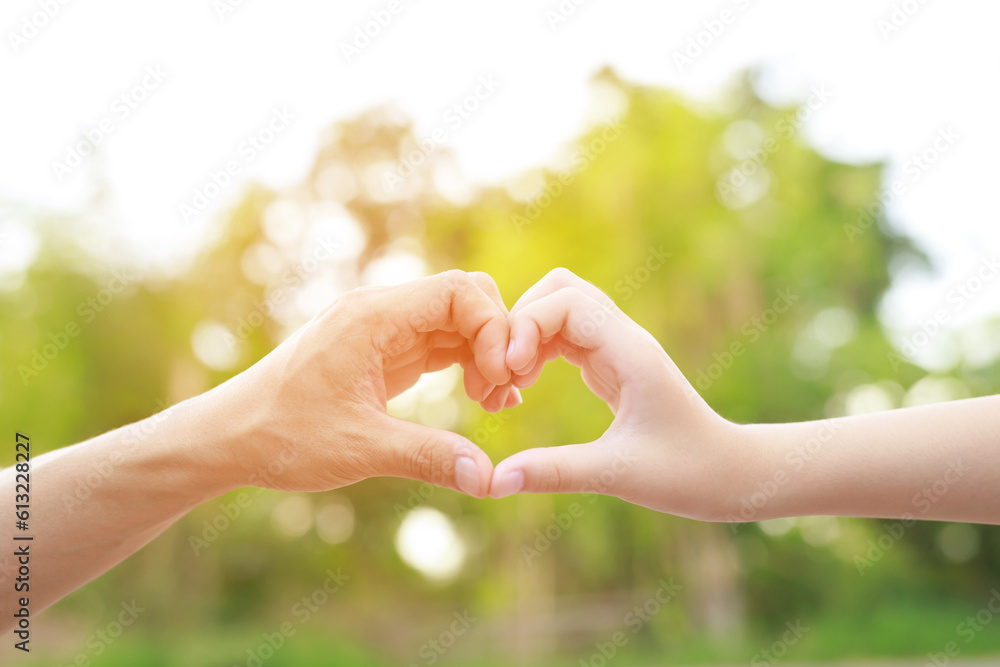 Children's hands with the warmth of mother's care Children's hands with the warmth of mother's care