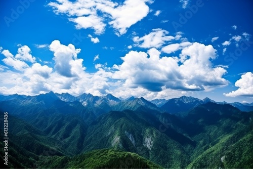 Mountain range with blue sky and white clouds. Generative AI