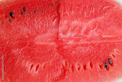 Red watermelon texture background image, rich in nutrients that are beneficial to health.