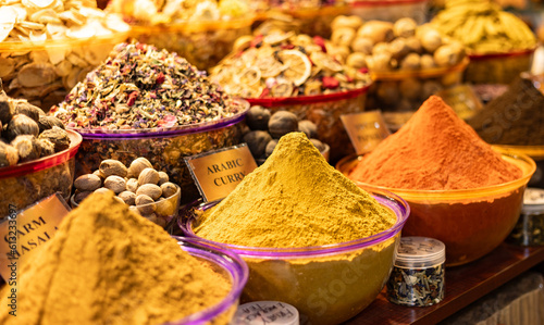 UEA, Dubai district Deira, spice market, April 2023. Old traditional souk for spices and herbs. Curry, masala, pepper, dried blossoms, paprika, pepper and other ingredients.