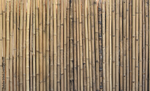 Old bamboo plank fence texture material construction for background.