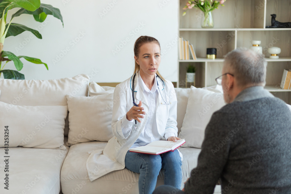 Female doctor examining older senior man in doctor office or at home. Old man patient and doctor have consultation in hospital room. Medicine healthcare medical checkup. Visit to doctor Female doctor examining older senior man in doctor office or at home. Old man patient and doctor have consultation in hospital room. Medicine healthcare medical checkup. Visit to doctor