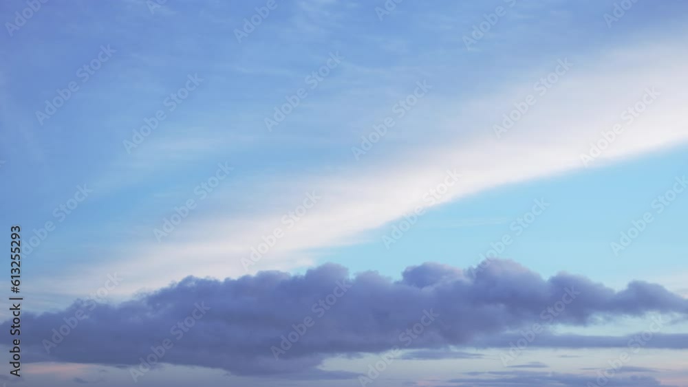 Fluffy sparse clouds slowly moving in the blue sky, sky background, timelapse video. Fluffy sparse clouds slowly moving in the blue sky, sky background, timelapse video.