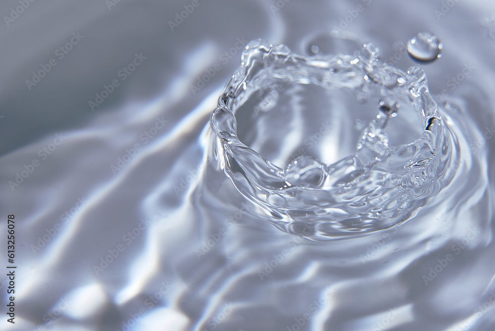 052.One or more drops of water splashing into waves and undefined shapes. Wallpaper 052.One or more drops of water splashing into waves and undefined shapes. Wallpaper
