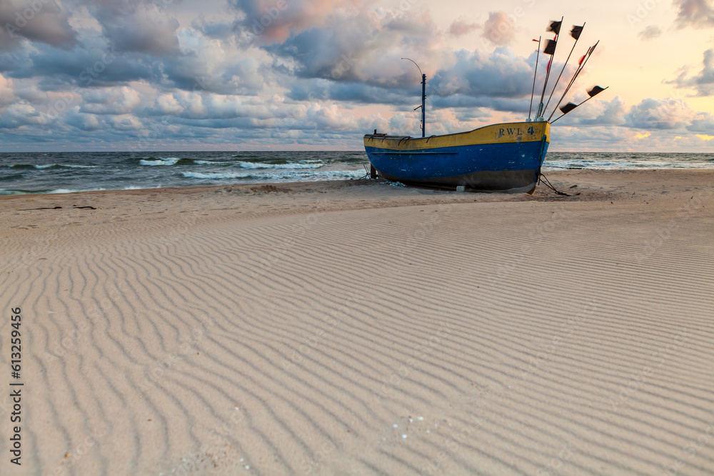 Beautiful fishing boat on the beach in Rewal.