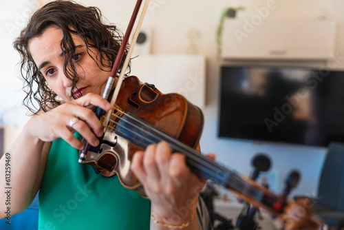 Concert-Bound: Young Violinist Rehearsing Diligently at Home