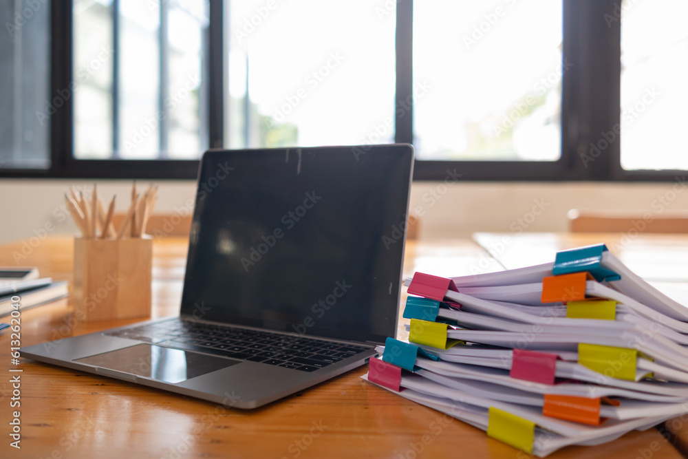 A huge stacked documents is an annual earnings summary document prepared for business people to use in attending meetings and this stacked paper is also an important document. A huge stacked documents is an annual earnings summary document prepared for business people to use in attending meetings and this stacked paper is also an important document.