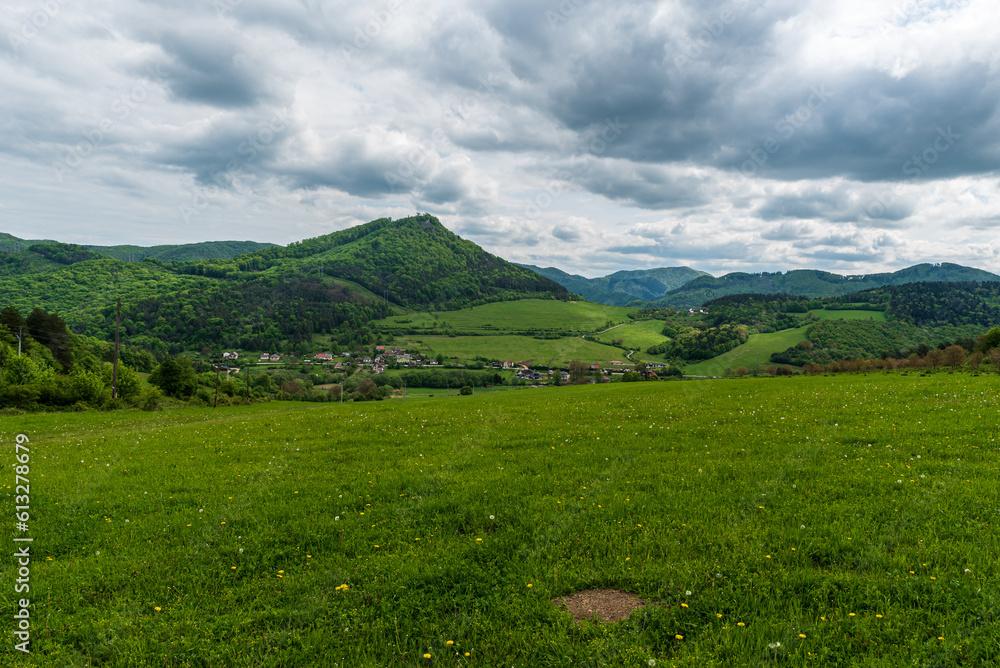 Horna Poruba village with hills of Strazovske vrchy mountains around in Slovakia Horna Poruba village with hills of Strazovske vrchy mountains around in Slovakia