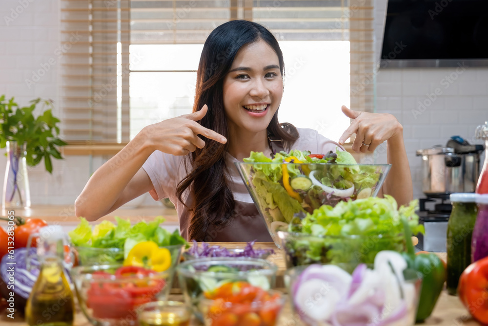 Woman love eating homemade salad for good health. Woman love eating homemade salad for good health.