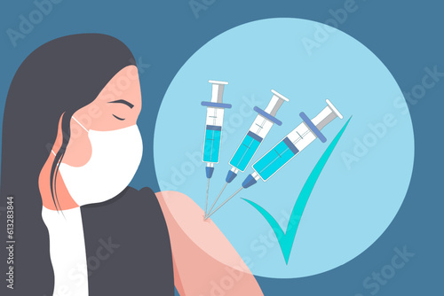 Woman in medical mask showing vaccinated shoulder with third shots or booster shots symbol, vaccination against COVID-19 concept