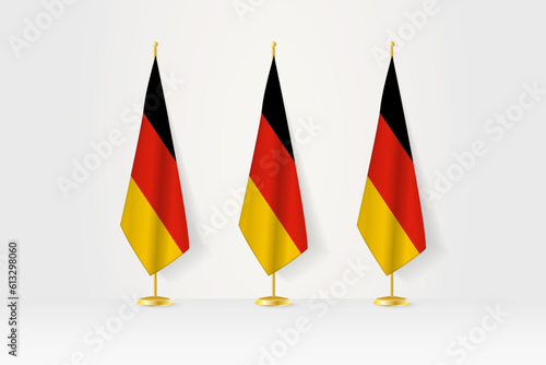 Three Germany flags in a row on a golden stand, illustration of press conference and other meetings.