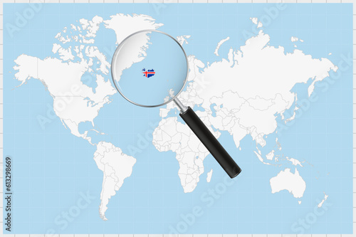 Magnifying glass showing a map of Iceland on a world map.