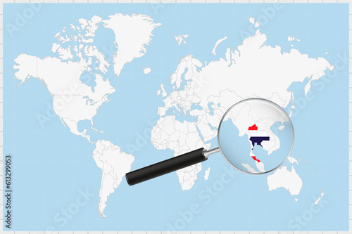 Magnifying glass showing a map of Thailand on a world map.