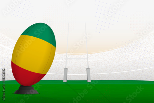 Guinea national team rugby ball on rugby stadium and goal posts  preparing for a penalty or free kick.