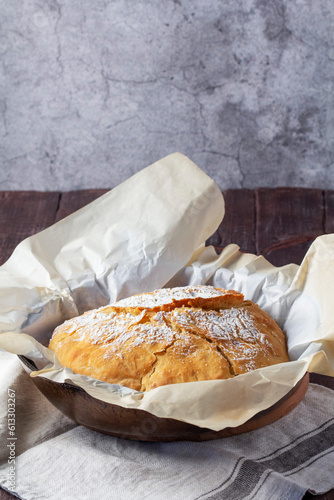 Obraz na płótnie Homemade ciabatta bread with whole grain flour on a wooden background. Rustic style. w salonie