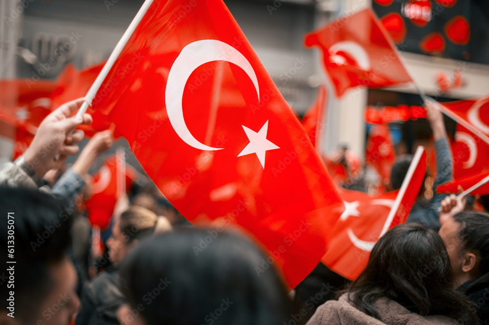 People waving turkish flag at the Commemoration of Ataturk, Youth and Sports Day - obrazy, fototapety, plakaty 