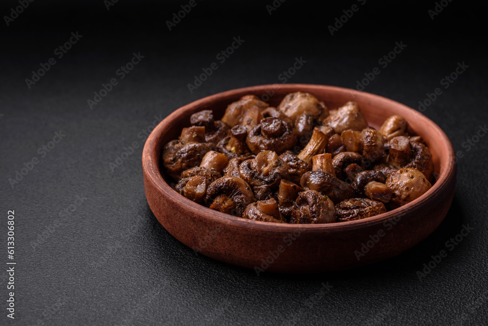 Delicious champignon mushrooms with salt, spices and herbs Delicious champignon mushrooms with salt, spices and herbs