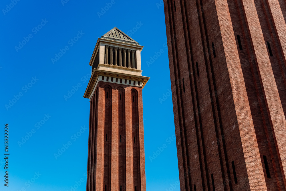 Two Venetian towers in Barcelona, made of exposed brick, built during the universal exhibition of 1929.