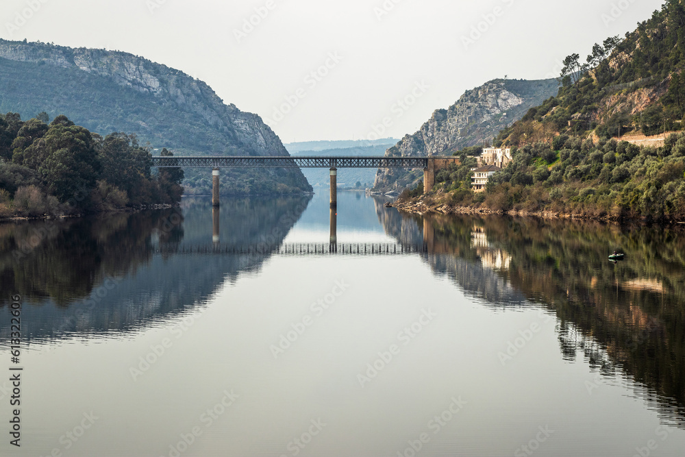 View of the Tagus river in Vila Velha de Ródão, Portugal, and in the background the road bridge and the natural monument Portas de Ródão.