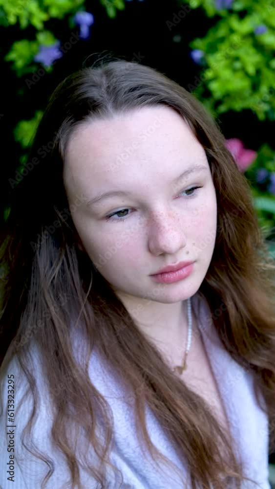 beautiful young girl woman teenager spring Outdoors beautiful pendant around her neck with a butterfly shape Lilac clothes gentle make-up female natural beauty virginity Tenderness vertical video beautiful young girl woman teenager spring Outdoors beautiful pendant around her neck with a butterfly shape Lilac clothes gentle make-up female natural beauty virginity Tenderness vertical video