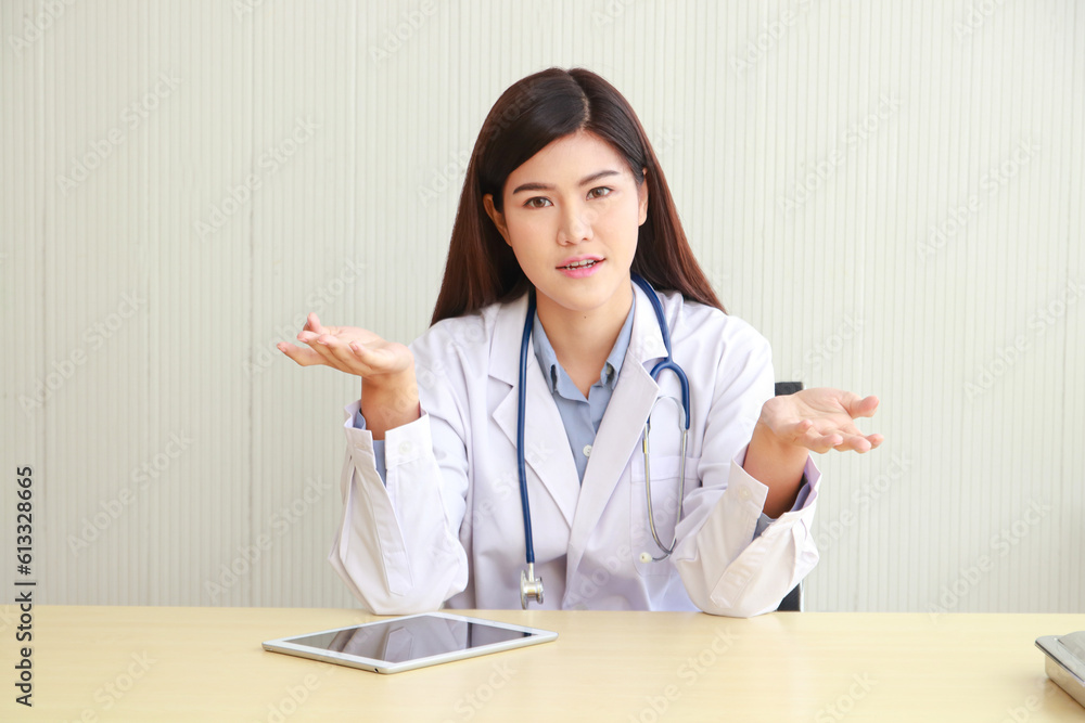 Female doctor talking to patient online on laptop computer. concept of medical services in a hospital Female doctor talking to patient online on laptop computer. concept of medical services in a hospital