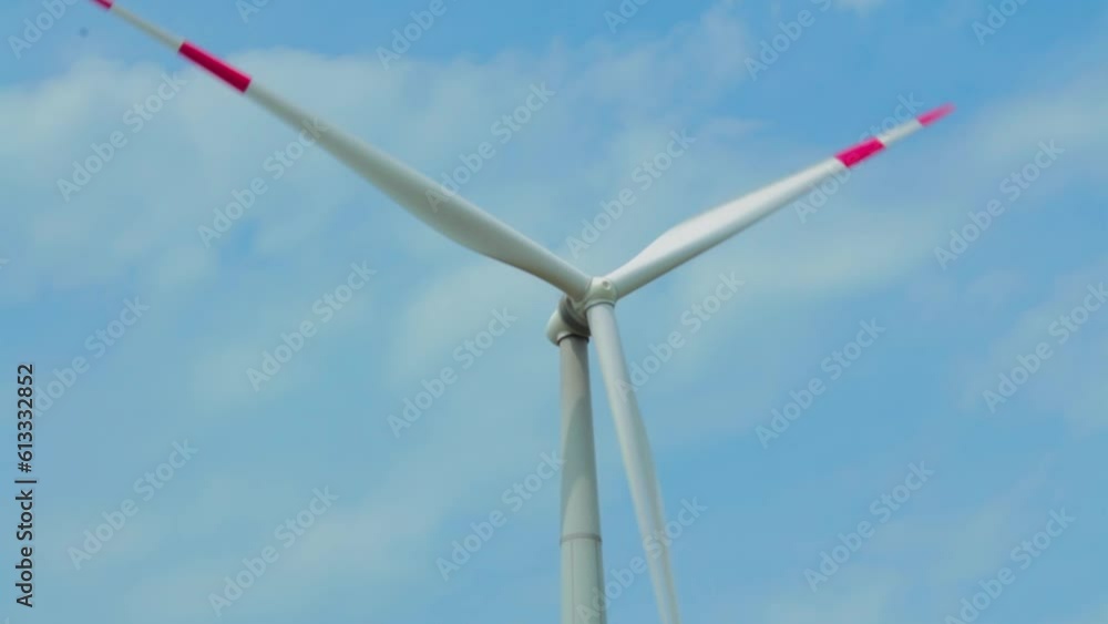 Wind turbines on green field in countryside, aerial view Wind turbines on green field in countryside, aerial view