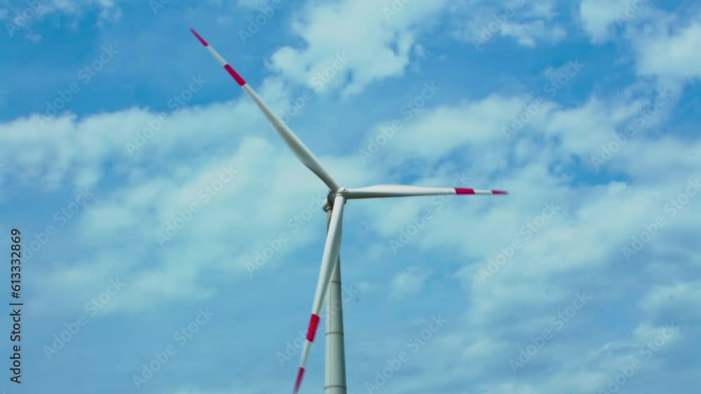 Wind turbines on green field in countryside, aerial view Wind turbines on green field in countryside, aerial view