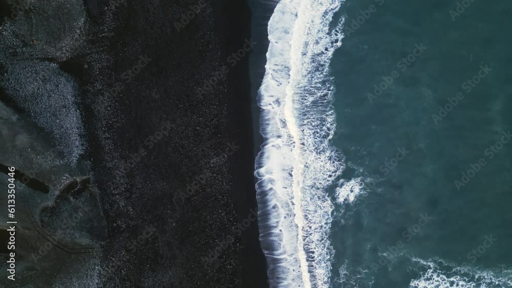 Drone shot of nordic black sand beach in iceland, majestic atlanic shore with icelandic landscape and polar scenery. Beautiful scenic route with waves crashing ocean coastline. Slow motion. Drone shot of nordic black sand beach in iceland, majestic atlanic shore with icelandic landscape and polar scenery. Beautiful scenic route with waves crashing ocean coastline. Slow motion.