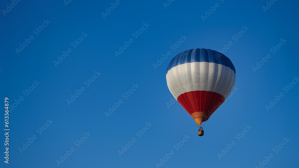 Hot air balloon in the blue sky Hot air balloon in the blue sky