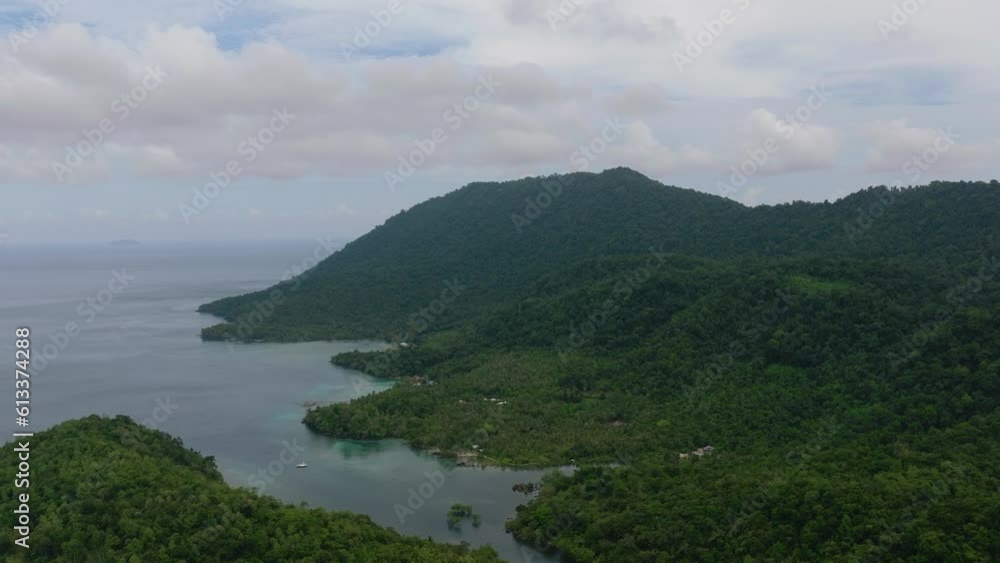 Aerial drone of Weh island with jungle and blue sea. Aceh, Indonesia. Aerial drone of Weh island with jungle and blue sea. Aceh, Indonesia.